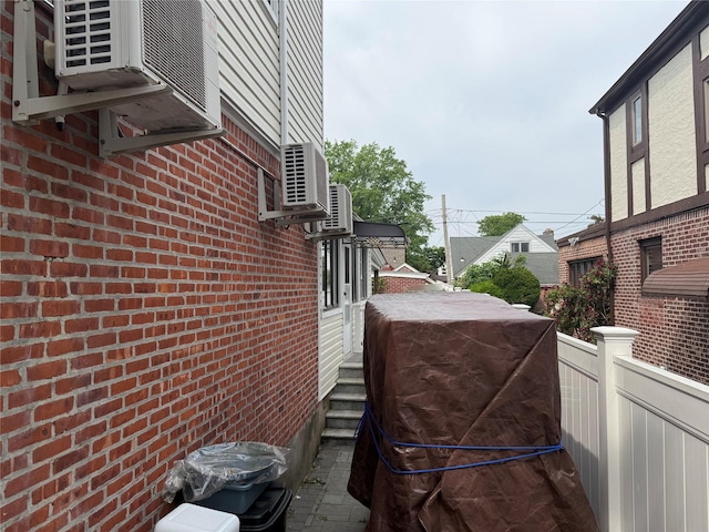 7308 187th St, Fresh Meadows, NY 11366 - view of side of property featuring brick siding
