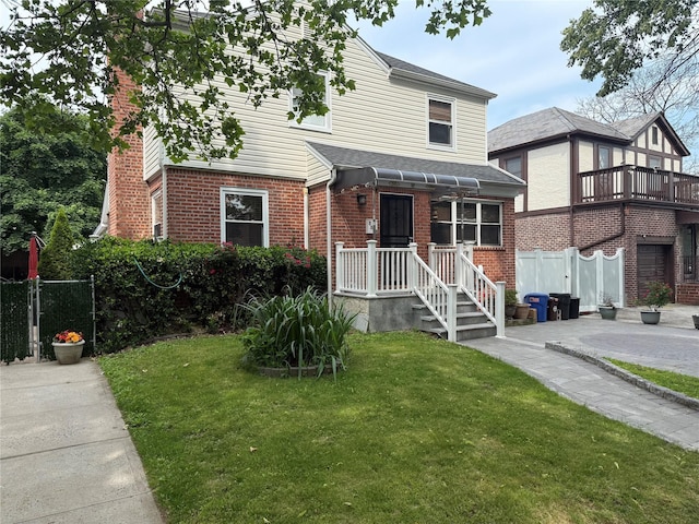 7308 187th St, Fresh Meadows, NY 11366 - view of front facade featuring brick siding and a shingled roof