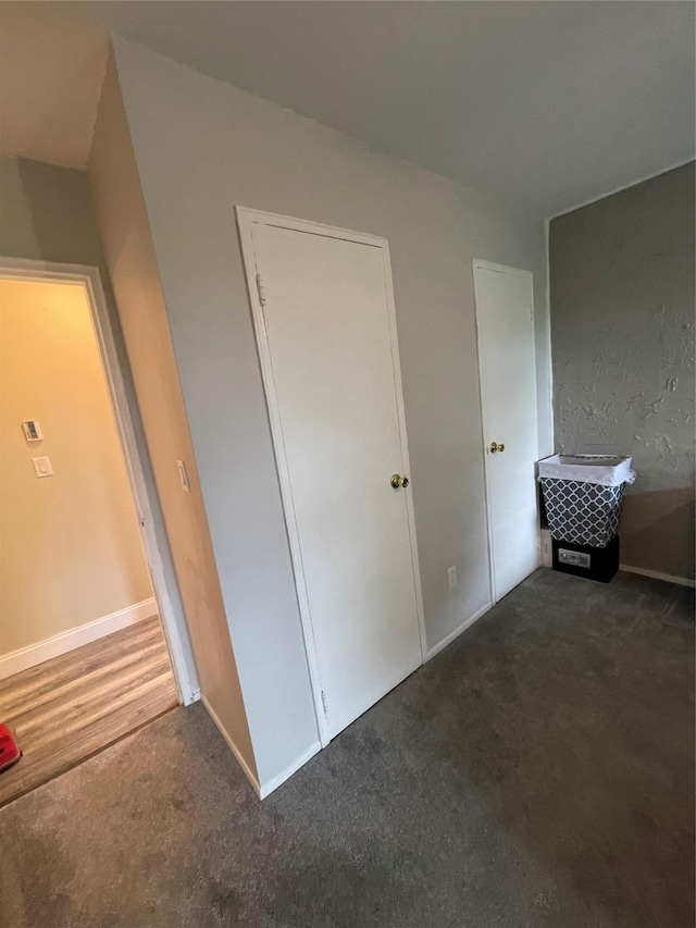 701 Towne House Vlg Unit 701, Hauppauge, NY 11749 - unfurnished bedroom featuring carpet floors