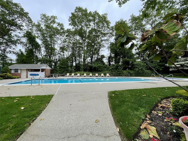 701 Towne House Vlg Unit 701, Hauppauge, NY 11749 - community pool featuring a patio