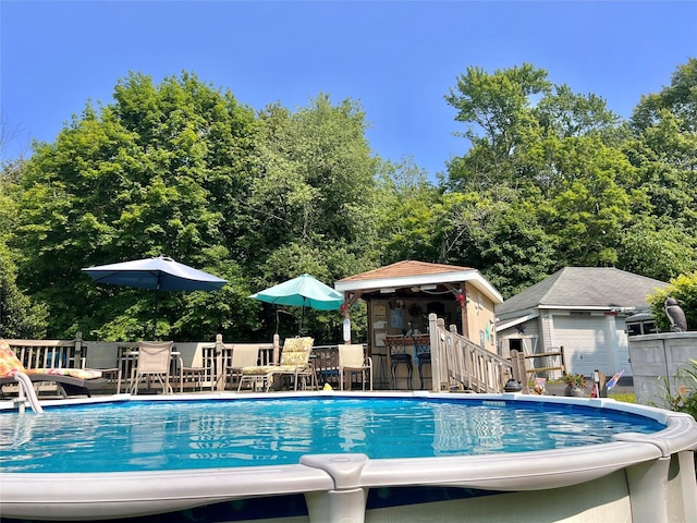 421 Orchard Dr, Wallkill, NY 12589 - outdoor pool featuring an outbuilding