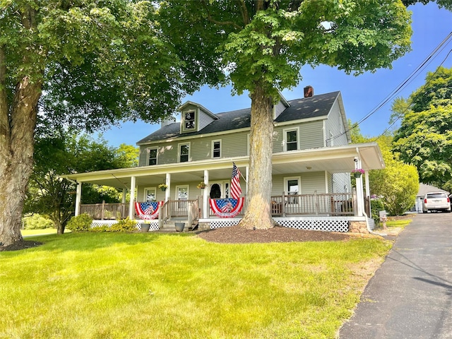 421 Orchard Dr, Wallkill, NY 12589 - farmhouse with covered porch, a front lawn, and roof with shingles