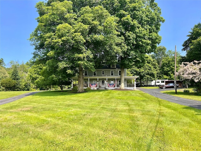 421 Orchard Dr, Wallkill, NY 12589 - view of front of house with a front lawn and covered porch