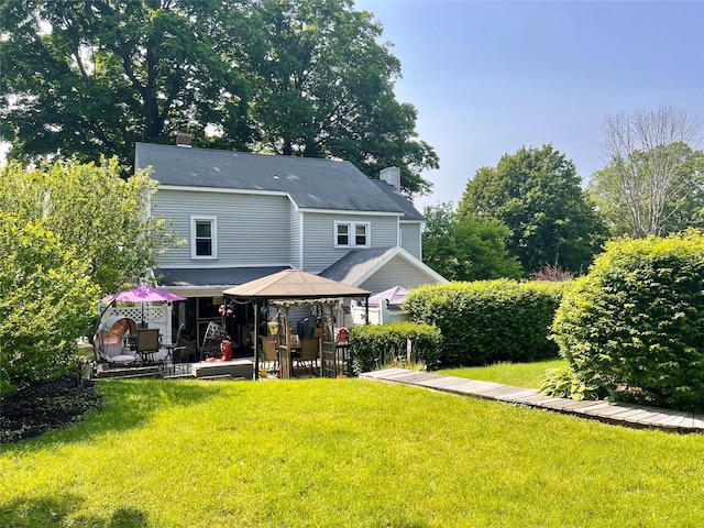 421 Orchard Dr, Wallkill, NY 12589 - back of house featuring a gazebo, a chimney, a patio, and a yard