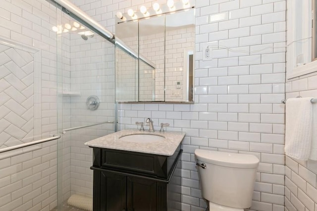 12 Hazel Pl, Woodmere, NY 11598 - bathroom with tile walls, vanity, and a stall shower