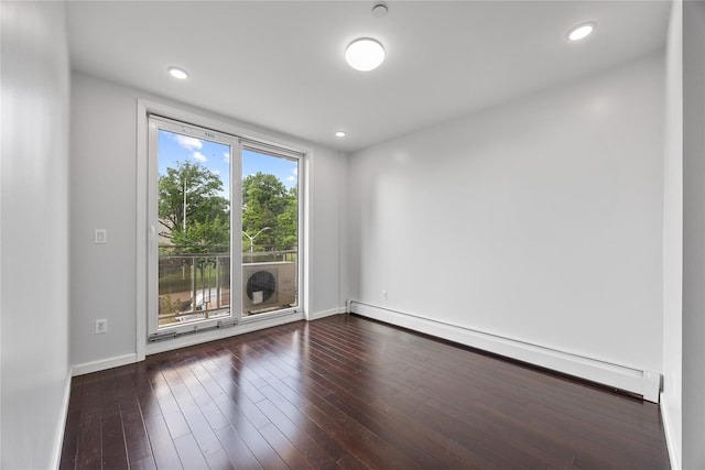 138-12 Northern Blvd Unit 3E, Flushing, NY 11354 - spare room featuring a baseboard heating unit, wood-type flooring, baseboards, and recessed lighting