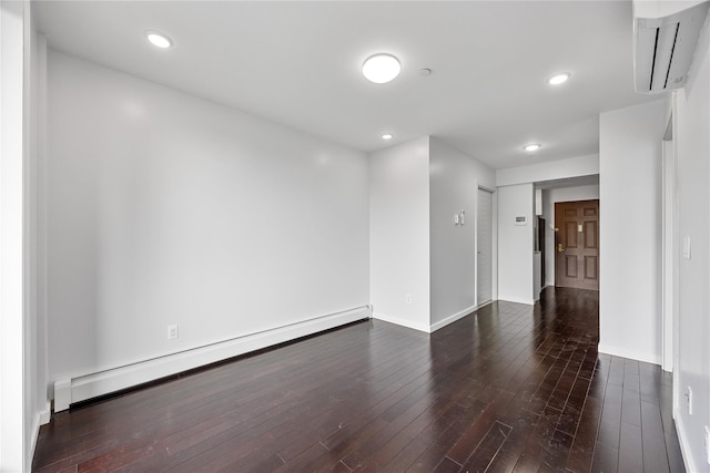 138-12 Northern Blvd Unit 3E, Flushing, NY 11354 - unfurnished room with a baseboard radiator, an AC wall unit, hardwood / wood-style flooring, baseboards, and recessed lighting