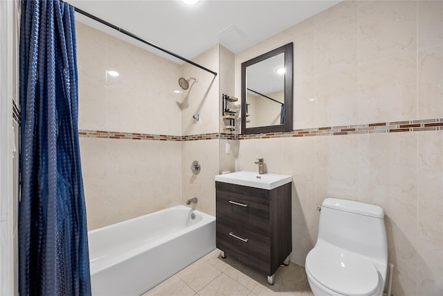 138-12 Northern Blvd Unit 3E, Flushing, NY 11354 - bathroom featuring tile walls, shower / bath combo, toilet, and vanity