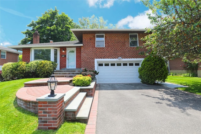 236 Martin Dr, Syosset, NY 11791 - view of front of house with a garage, asphalt driveway, a chimney, and brick siding