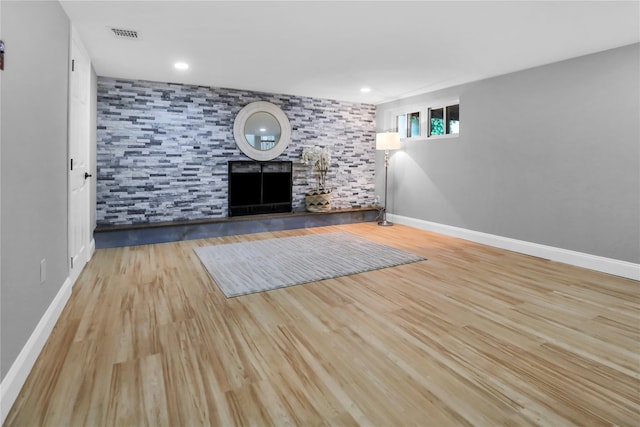 236 Martin Dr, Syosset, NY 11791 - unfurnished living room with a tile fireplace, baseboards, and wood finished floors