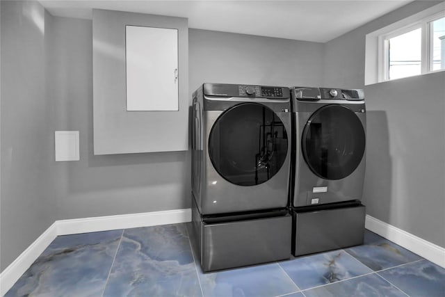 236 Martin Dr, Syosset, NY 11791 - washroom with washing machine and clothes dryer and baseboards