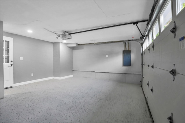 236 Martin Dr, Syosset, NY 11791 - garage with a garage door opener and electric panel