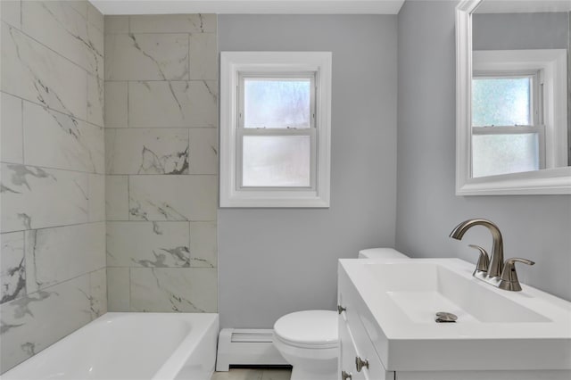 1459 Prince St, Baldwin, NY 11510 - bathroom featuring baseboard heating, vanity, toilet, and healthy amount of natural light