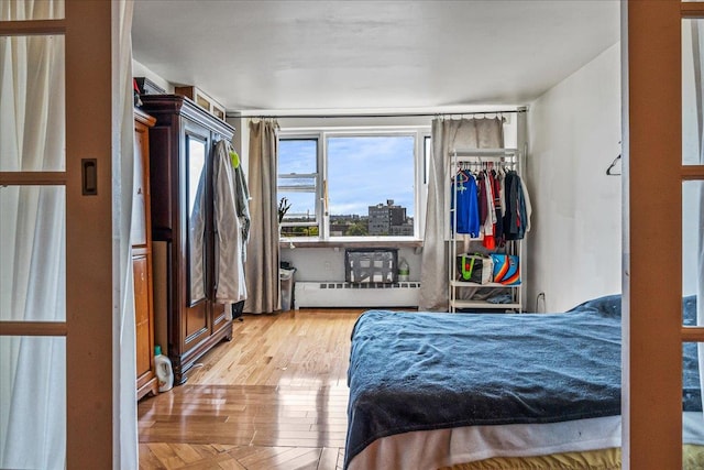 1655 Flatbush Ave Unit A1102, Brooklyn, NY 11210 - bedroom featuring hardwood / wood-style floors and radiator