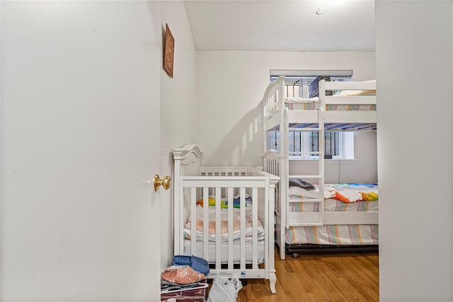 218 Middleton St Unit Apt6Rooftop, Brooklyn, NY 11206 - bedroom featuring wood finished floors and a nursery area