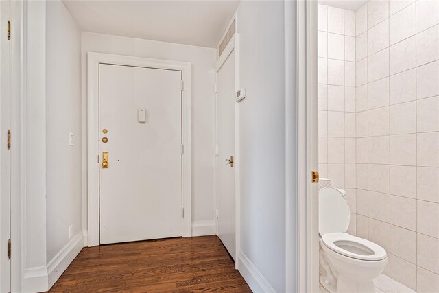 218 Middleton St Unit Apt6Rooftop, Brooklyn, NY 11206 - doorway to outside featuring dark wood-type flooring, tile walls, and baseboards