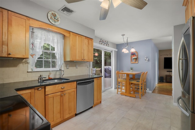 16 Shipley Dr, Cortlandt Manor, NY 10567 - kitchen featuring stainless steel appliances, backsplash, a ceiling fan, and decorative light fixtures