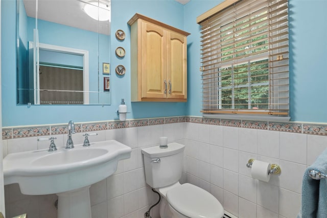 16 Shipley Dr, Cortlandt Manor, NY 10567 - bathroom featuring tile walls and a wainscoted wall