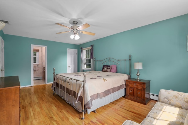 16 Shipley Dr, Cortlandt Manor, NY 10567 - bedroom with a baseboard radiator, light wood-style floors, a ceiling fan, connected bathroom, and a baseboard heating unit