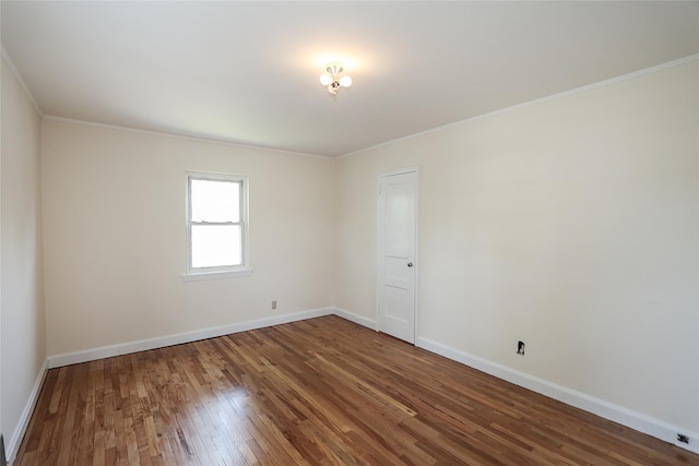 99 Roosevelt Ct, Carle Place, NY 11514 - unfurnished room featuring wood finished floors, crown molding, and baseboards