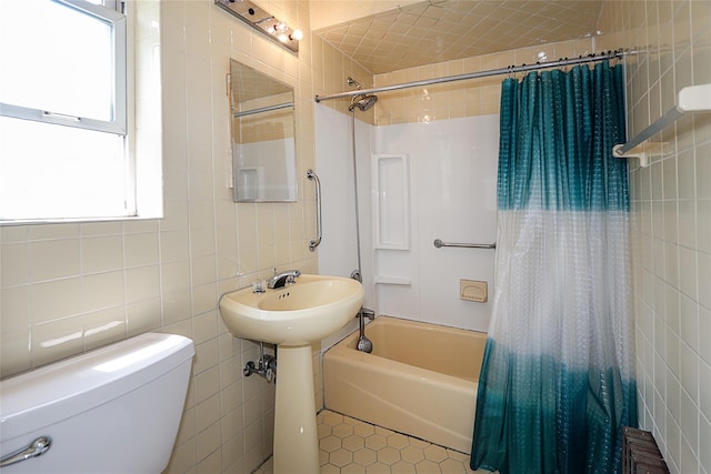 99 Roosevelt Ct, Carle Place, NY 11514 - full bathroom with tile walls, toilet, shower / tub combo, radiator, and a sink