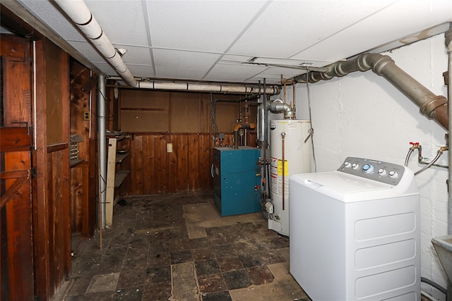 99 Roosevelt Ct, Carle Place, NY 11514 - washroom featuring washer / dryer, water heater, a heating unit, and wood walls