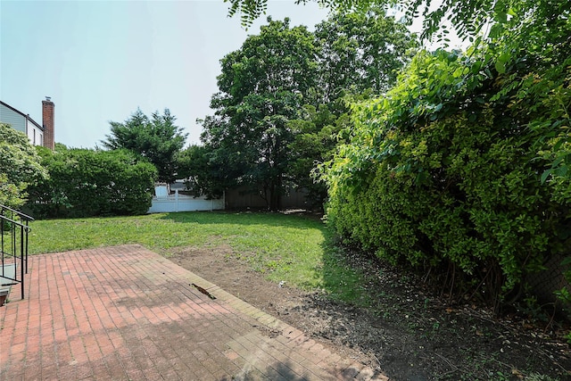 99 Roosevelt Ct, Carle Place, NY 11514 - view of yard with a patio area