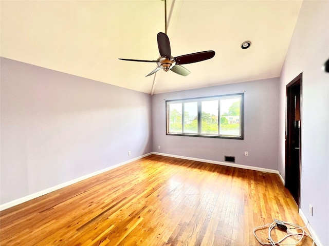 636 Derby Ave, Woodmere, NY 11598 - spare room with lofted ceiling, ceiling fan, light wood-style floors, and baseboards