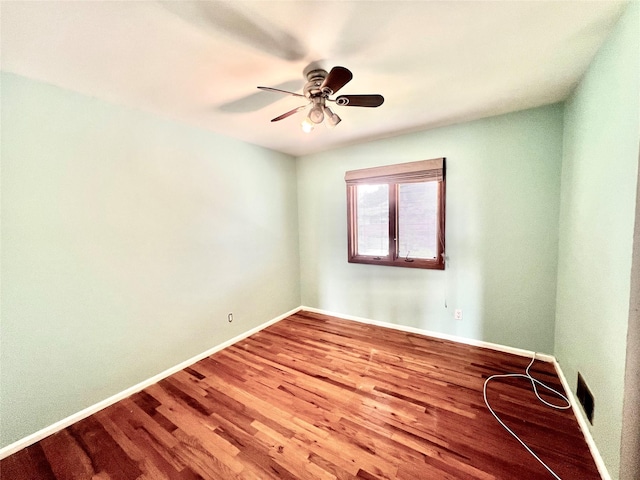 636 Derby Ave, Woodmere, NY 11598 - empty room with wood finished floors, ceiling fan, and baseboards