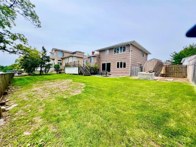 636 Derby Ave, Woodmere, NY 11598 - back of property with stairs, a deck, and central air condition unit