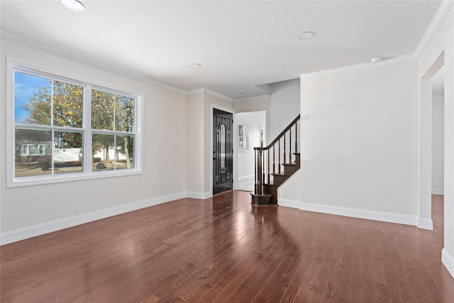 78 Jesse St, Freeport, NY 11520 - foyer entrance with wood finished floors, stairway, baseboards, ornamental molding, and recessed lighting