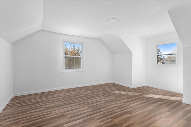 78 Jesse St, Freeport, NY 11520 - bonus room featuring lofted ceiling, plenty of natural light, wood finished floors, and baseboards