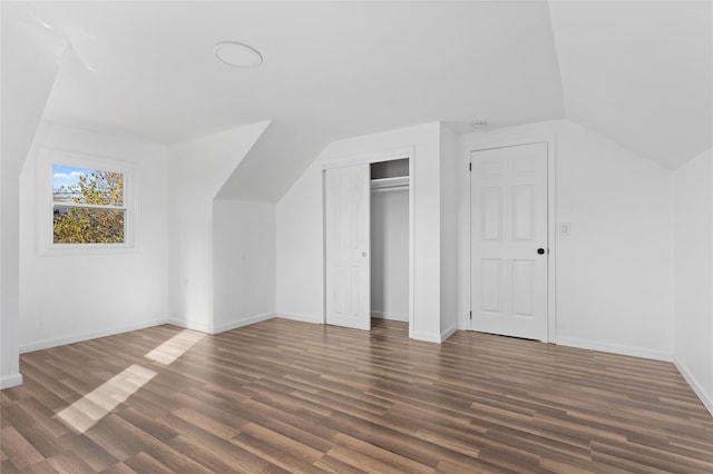 78 Jesse St, Freeport, NY 11520 - additional living space with wood finished floors, lofted ceiling, and baseboards