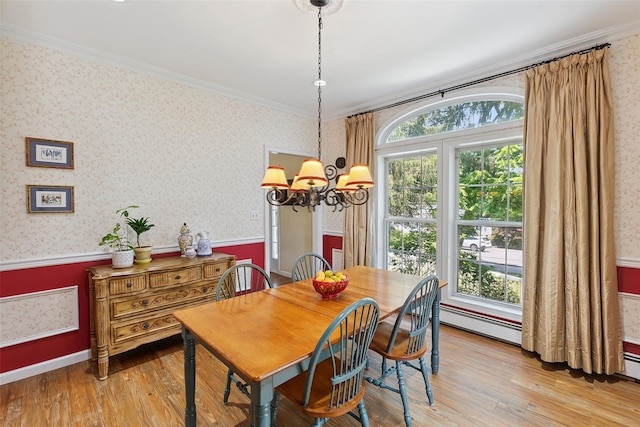 1771 Hanover St, Yorktown Heights, NY 10598 - dining room with wallpapered walls, wainscoting, a chandelier, light wood-style flooring, and ornamental molding
