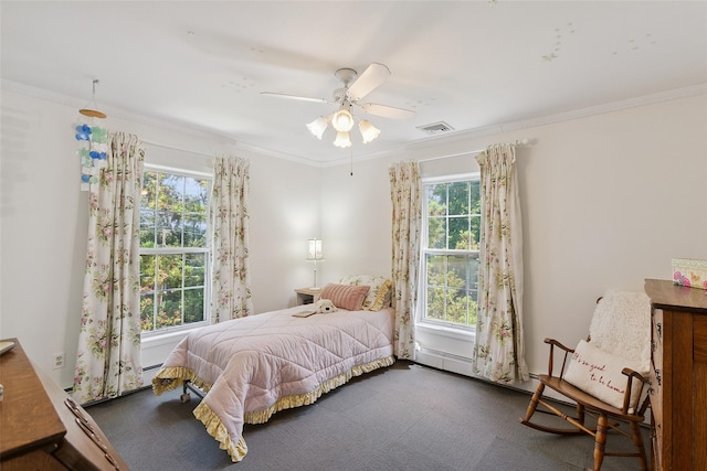 1771 Hanover St, Yorktown Heights, NY 10598 - carpeted bedroom with multiple windows, crown molding, ceiling fan, and a baseboard heating unit