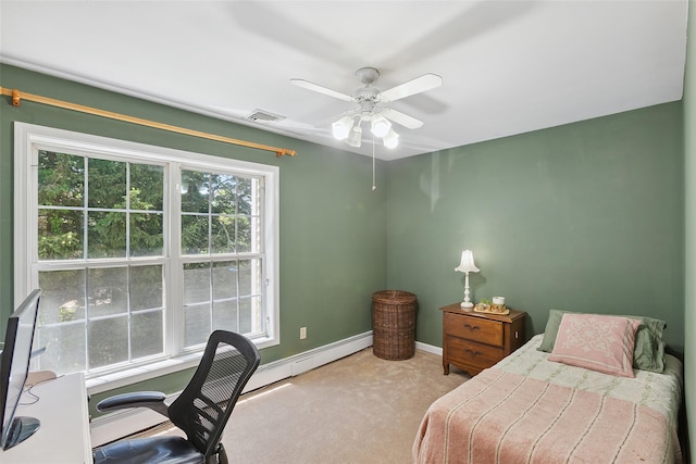 1771 Hanover St, Yorktown Heights, NY 10598 - bedroom featuring a baseboard radiator, carpet flooring, an office area, and a ceiling fan