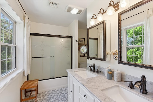 1771 Hanover St, Yorktown Heights, NY 10598 - bathroom featuring bath / shower combo with glass door and double vanity