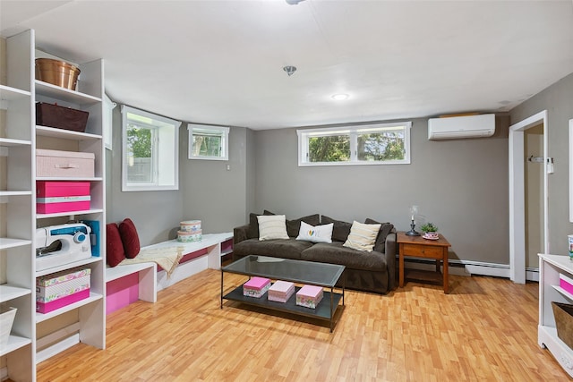 1771 Hanover St, Yorktown Heights, NY 10598 - living room with a wall mounted AC, wood finished floors, and a baseboard heating unit