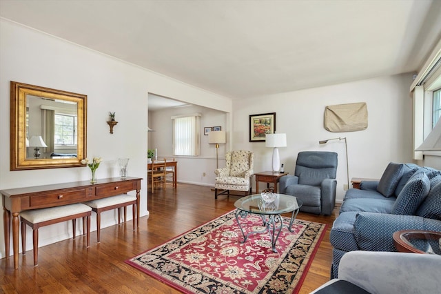 6 Plumtree Ln, South Huntington, NY 11746 - living room with plenty of natural light, wood finished floors, and baseboards