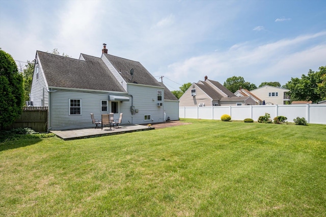 6 Plumtree Ln, South Huntington, NY 11746 - back of house with a chimney, roof with shingles, and a wooden deck