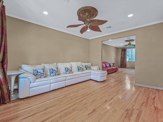 1674 Birch Dr, Merrick, NY 11566 - living room with ceiling fan, wood finished floors, recessed lighting, ornamental molding, and baseboards