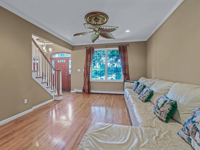 1674 Birch Dr, Merrick, NY 11566 - living room with wood finished floors, baseboards, ornamental molding, a baseboard heating unit, and recessed lighting