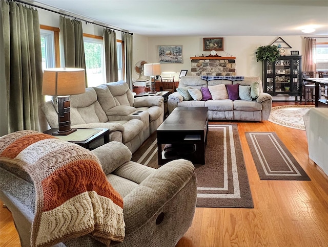 74 E Ridge Rd, Warwick, NY 10990 - living room featuring wood finished floors and a fireplace