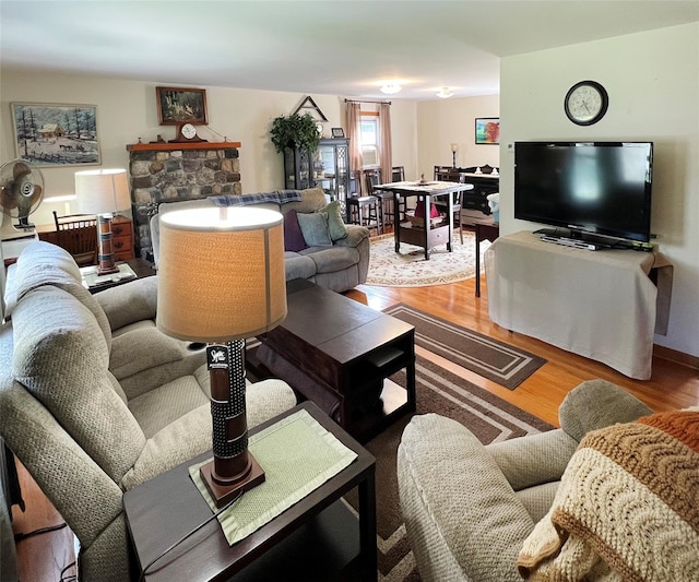 74 E Ridge Rd, Warwick, NY 10990 - living room with wood finished floors and a fireplace