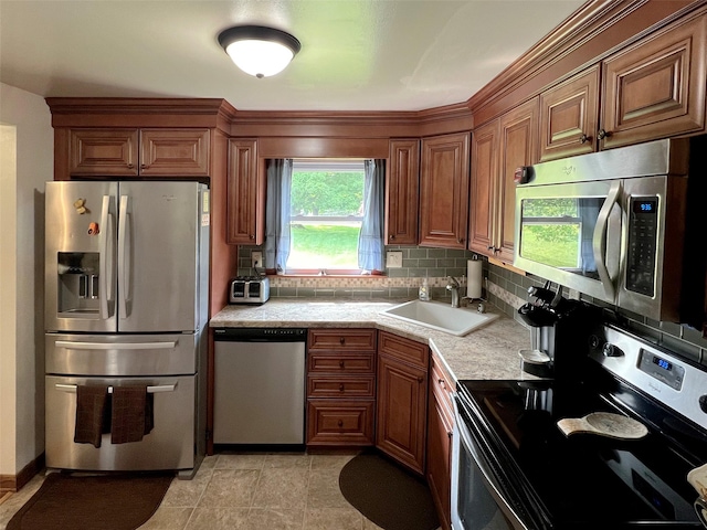 74 E Ridge Rd, Warwick, NY 10990 - kitchen with stainless steel appliances, light countertops, a sink, and healthy amount of natural light