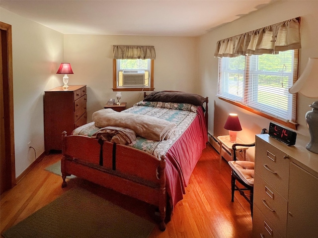 74 E Ridge Rd, Warwick, NY 10990 - bedroom with light wood-style floors and cooling unit