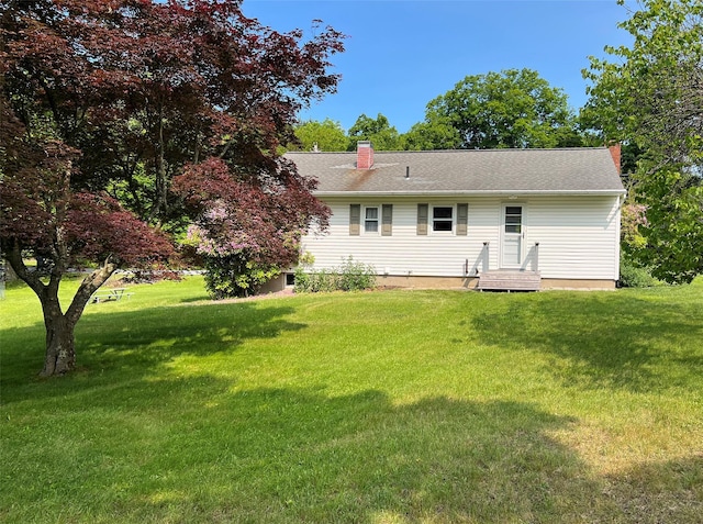 74 E Ridge Rd, Warwick, NY 10990 - rear view of house with a yard and a chimney
