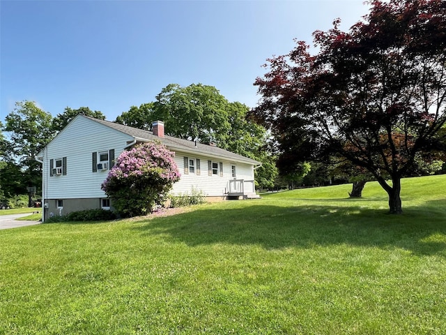 74 E Ridge Rd, Warwick, NY 10990 - view of side of home with a yard and a chimney