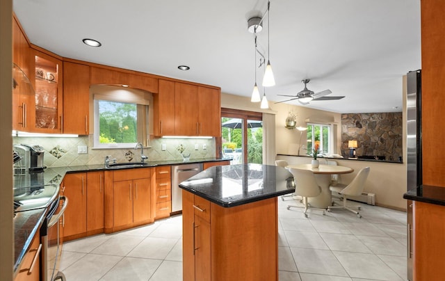 34 Oak Meadow Rd, Commack, NY 11725 - kitchen with electric range, dishwasher, tasteful backsplash, a kitchen island, and healthy amount of natural light