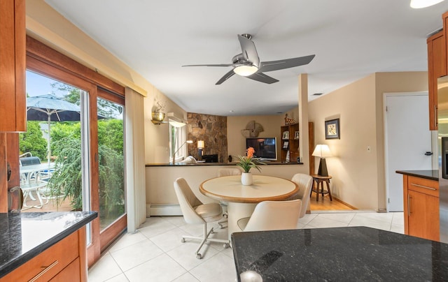 34 Oak Meadow Rd, Commack, NY 11725 - dining space featuring a ceiling fan and light tile patterned floors